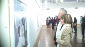 Dudziro Exhibition's attendees enjoying Zvavahera's artwork.